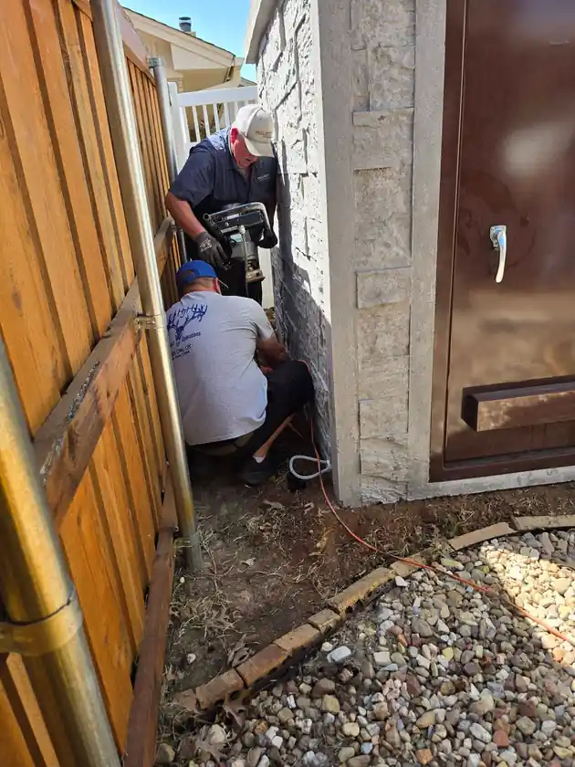 HJH Outdoor Operations installing a residential storm shelter in Oklahoma
