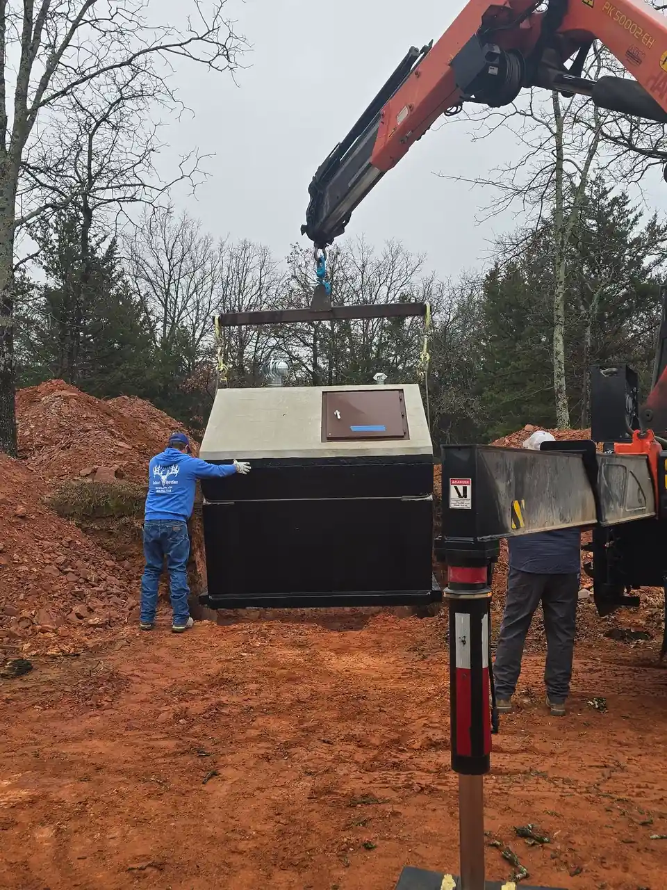 Storm shelter being installed in Oklahoma residential yard